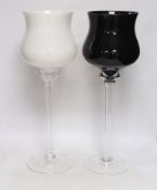 A pair of Polish black and white tall stemmed large bowled glasses, 50cm high