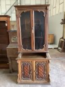 A Continental walnut side cabinet, width 86cm, depth 40cm, height 190cm