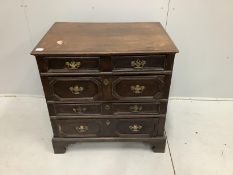A small 17th century and later oak chest of four drawers, width 83cm, depth 58cm, height 83cm