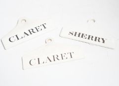 Three late 18th century creamware cellar labels, two claret stamped Wedgwood and one sherry,