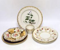 A Derby ‘botanical specimen’ plate, c.1800, together with four 19th century English plates and a