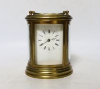 A late 19th century French oval brass cased eight day carriage clock