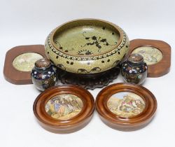 A Chinese cloisonné enamel bowl on a wooden stand, a pair of cloisonné jars with covers, and four