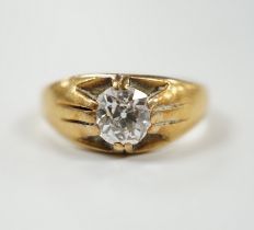 A late Victorian 18ct gold and claw set solitaire diamond ring, size P, gross weight 6.1 grams,