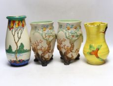 A pair of Clarice Cliff pottery vases, Ducal vase and a jug, largest 23cm high