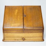 An Edwardian oak stationery casket, 31cm high, 38cm wide, 21.5cm deep