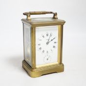 A late 19th century French brass cased eight day carriage clock with incorporated alarm mechanism,