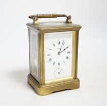 A late 19th century French brass cased eight day carriage clock with incorporated alarm mechanism,