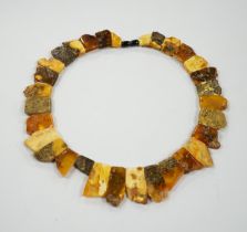 A contemporary Baltic amber fringe necklace, 46cm, gross weight 72 grams.