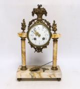 A late 19th century French gilt metal and variegated marble eight day pillar clock, 37cm high