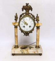 A late 19th century French gilt metal and variegated marble eight day pillar clock, 37cm high