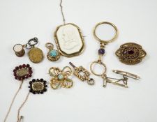 Two Georgian yellow metal mourning brooches, including garnet set and other items including garnet