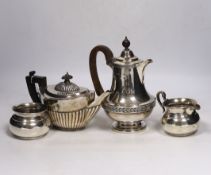 A late Victorian demi fluted silver oval teapot, John Round, Sheffield, 1897, a later silver hot