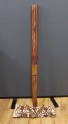 An Aboriginal decorated didgeridoo, a fabric painted panel and two decorated wooden sticks, fabric