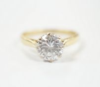 A modern 18ct gold and solitaire diamond set ring, size K/L, gross weight 2.7 grams, the stone