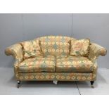 A Victorian style scroll arm two seater settee, width 170cm, depth 74cm, height 87cm