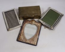 Two early to mid 20th century silver mounted photograph frames, largest 18cm, together with a George