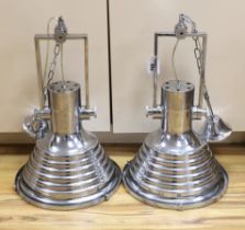 A large pair of chrome industrial hanging pendant lights, 102 including chain high