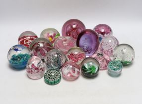 A group of glass paperweights including Caithness