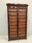 A 19th century French mahogany notary's cabinet, width 106cm, depth 37cm, height 182cm