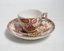 A miniature Dresden teacup and saucer in Meissen-style, cup 4.5cm