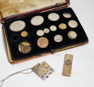 A 9 carat gold cigar cutter, silver pendant and a George VI specimen coin set a/f