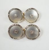 A pair of 14k yellow metal, mother of pearl and diamond chip set circular cufflinks, 12mm, gross