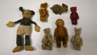 Deans Mickey Mouse and a group of Schuco and Schuco type toy animals (8)