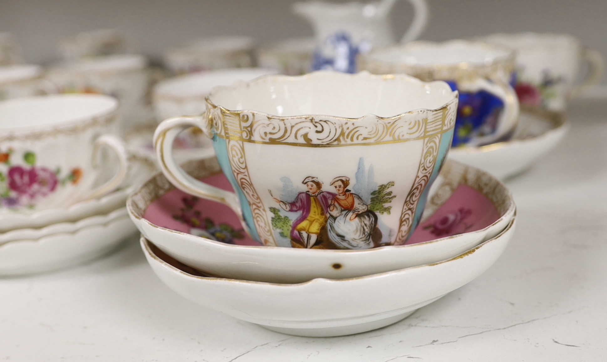 A group of porcelain Dresden tableware including cups and saucers and a blue and white jug - Image 3 of 6