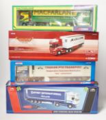 Four boxed Corgi and Universal Hobbies 1:50 scale articulated trucks; a Scania refrigerated lorry (