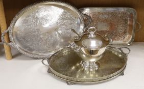 Four items of plated wares; a Victorian galleried tray, a soup tureen and two other trays, largest