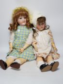 A Kestner JDK 168 bisque doll, 65cm and an AM390 doll with bisque head, 65cm