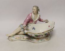 A 19th century Meissen figural sweetmeat dish with floral encrusted decoration, crossed swords