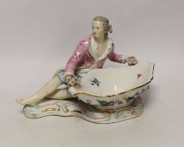 A 19th century Meissen figural sweetmeat dish with floral encrusted decoration, crossed swords