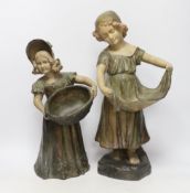 A pair of Austrian cold painted terracotta figurines, largest 45cm high