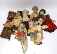 Nine dolls in European and Asian costumes