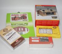 A collection of boxed and unconstructed 00 and HO Gauge model railway kits and trackside