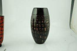 ** ** Vittorio Ferro (1932-2012) A Murano glass, black ground vase, with a spiral design of small