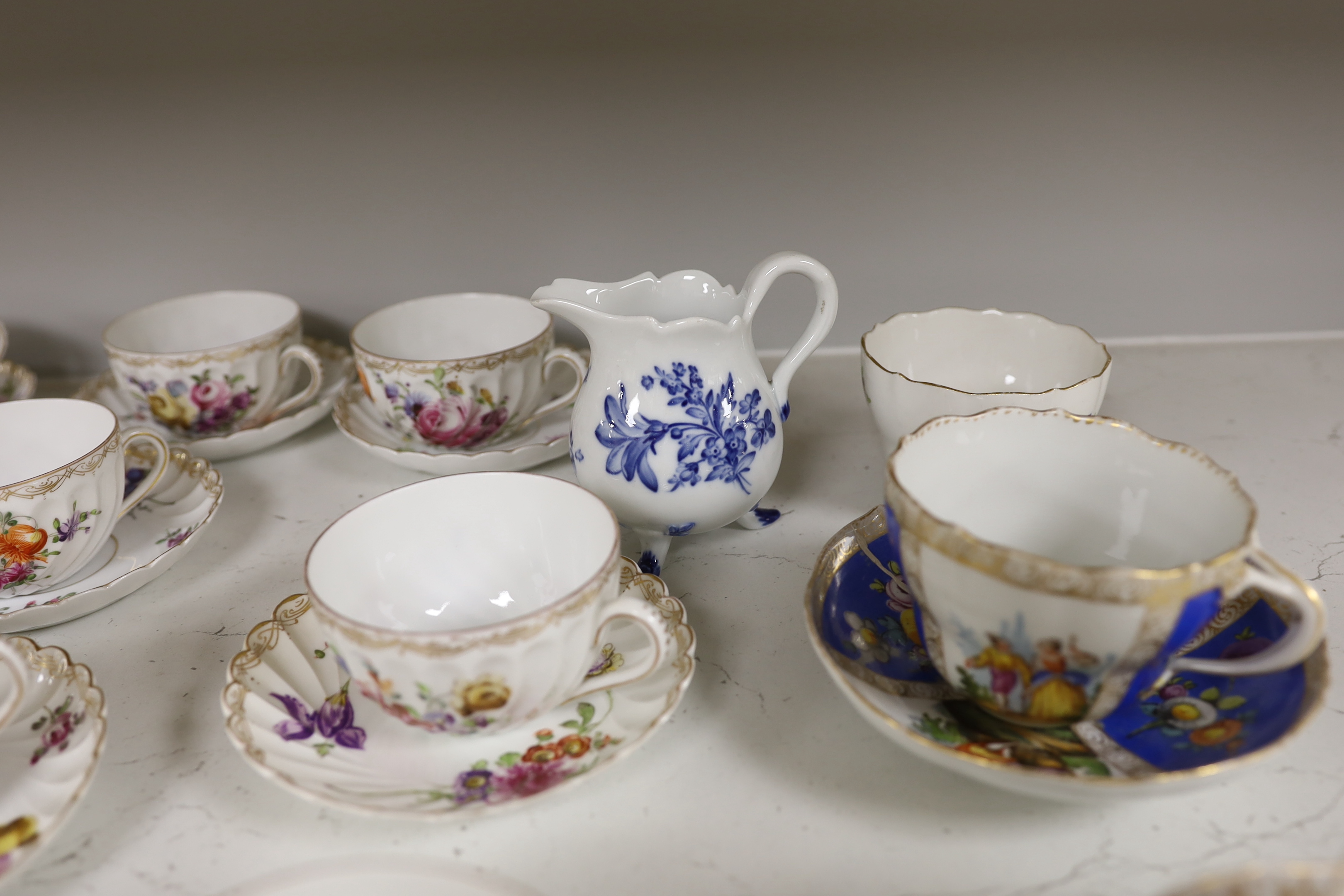 A group of porcelain Dresden tableware including cups and saucers and a blue and white jug - Image 4 of 6