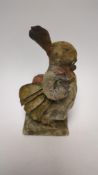 An F. Warne papier-mâché Beatrix Potter figure of Benjamin Bunny with pipe and red handkerchief bag,