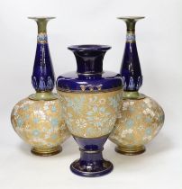 A pair of Royal Doulton Lambeth Slaters patent bottle vases and another similar vase, 41cm