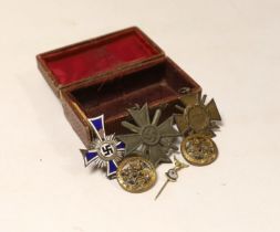 A WW1 Hindenburg Honour Cross A WW2 Silver German Mothers Cross showing some