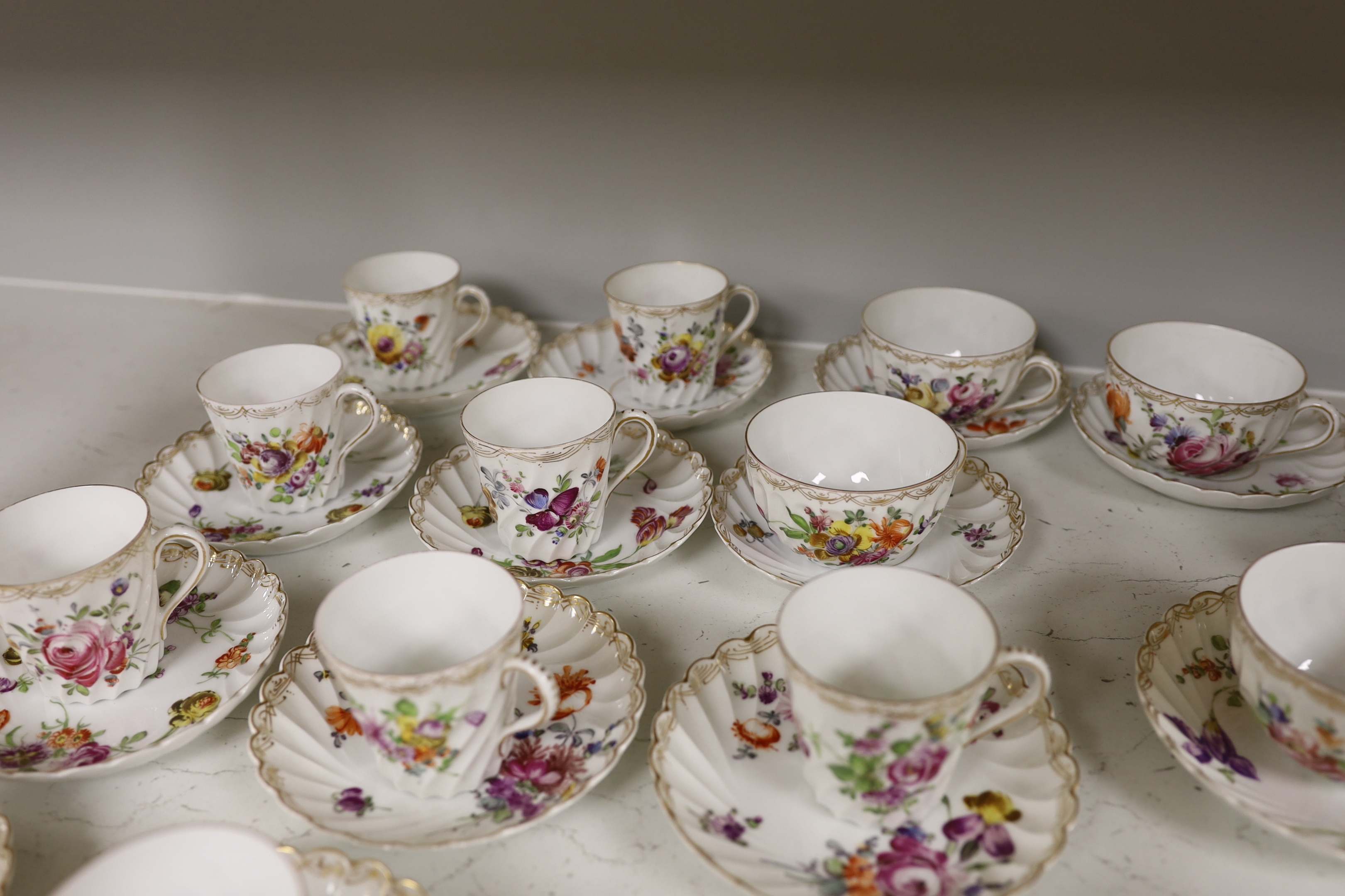 A group of porcelain Dresden tableware including cups and saucers and a blue and white jug - Image 5 of 6