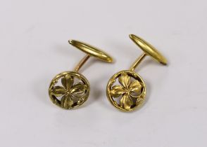 A pair of continental yellow metal overlaid circular cufflinks, of pierced foliate form, 14mm.