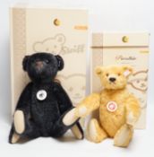 A blond Steiff somersaulting Teddy bear and a Steiff replica 1908 black Teddy bear, each boxed