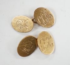 A pair of early 1960's 9ct gold oval cufflinks, with engraved crest and monogram, 10.3 grams.