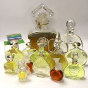 A collection of seventeen glass bottled perfumes; Guerlain Paris, Guy Laroche, Loris Azzaro, Van