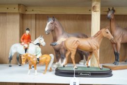 Five Beswick horses including a huntsman on a grey and Palomino pony with boy rider, huntsman 20.5cm