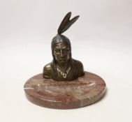 An ashtray in the form of a bronze native American on marble base, 21cm wide