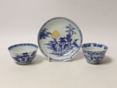 A Chinese Nanking Cargo blue and white saucer and tea bowl, and a Kangxi blue and white tea bowl,